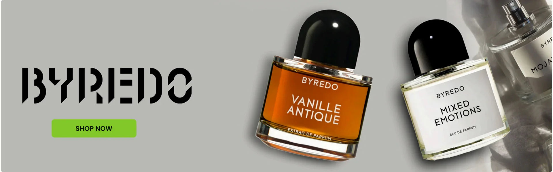Byredo perfumes Vanille Antique, Mixed Emotions, and Mojave Ghost bottles on grey background