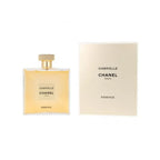 Chanel Gabrielle Essence Eau De Parfum 100ml bottle with floral and elegant design, displayed on a neutral background.